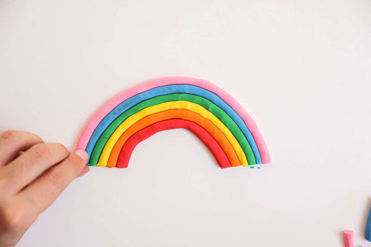 Bright handmade clay rainbow arches, a cheerful air dry clay craft for kids